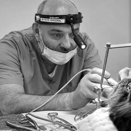 Dr Piotr at work in the dental operatory